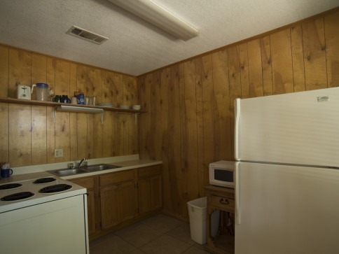 Kitchen area in cabin at Swaha Lodge & Marina.