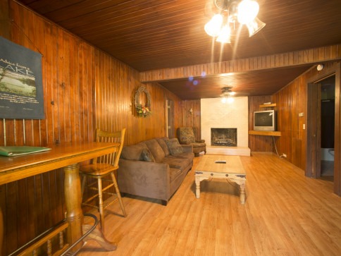 Den area in cabin at Swaha Lodge & Marina.