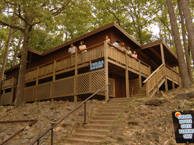 Swaha House Exterior - People on the porch.